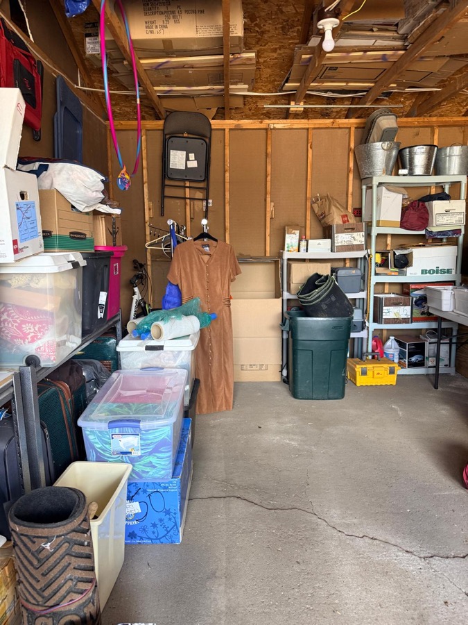After: fully cleared and organized garage with clean floor